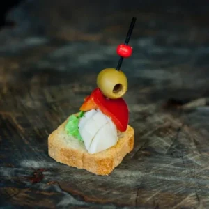 Кальмар в італійських травах з оливами та болгарським перцем