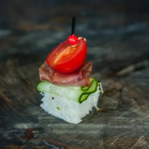 Канапе з бастурми, огірка, половинки Черрі на багеті